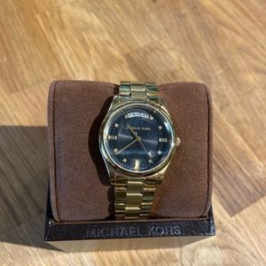 Michael Kors brassy gold watch